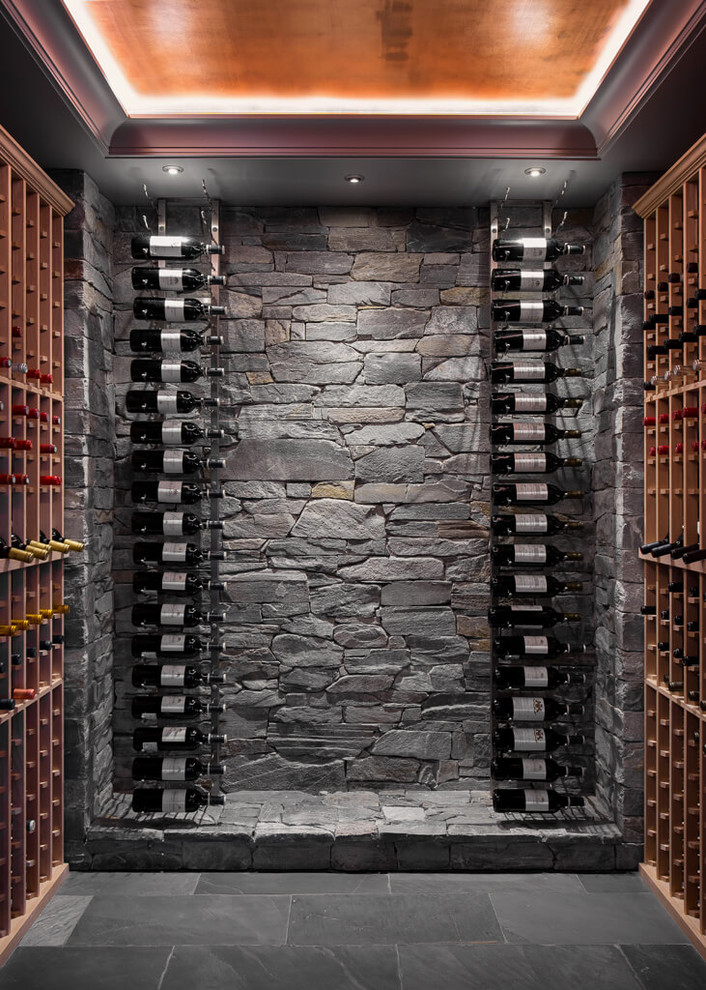 Rustic wine cellar in Vancouver with storage racks.