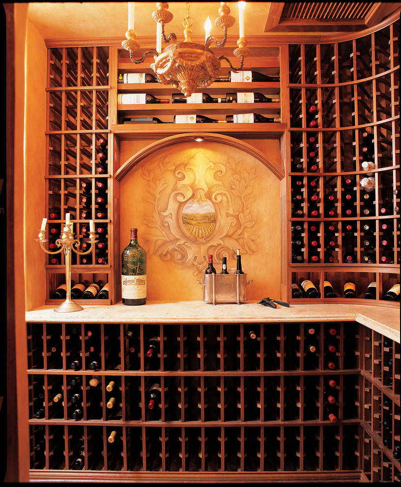 Inspiration for a small rustic wine cellar in San Diego with storage racks.