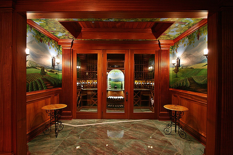 Design ideas for a medium sized traditional wine cellar in Cincinnati with marble flooring, display racks and green floors.