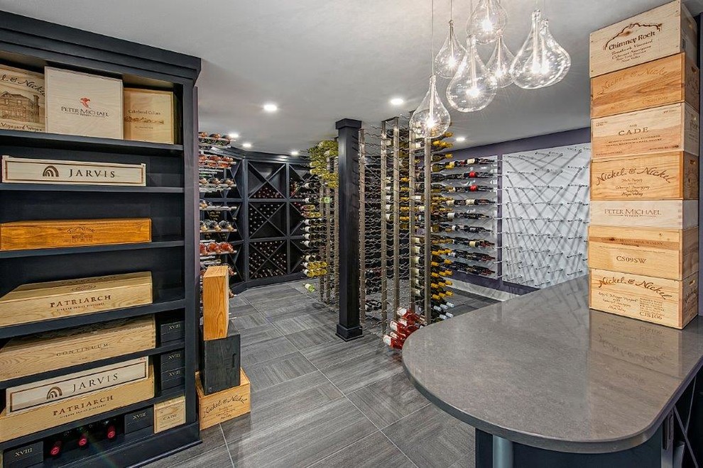 Inspiration for a large traditional wine cellar in Milwaukee with display racks.