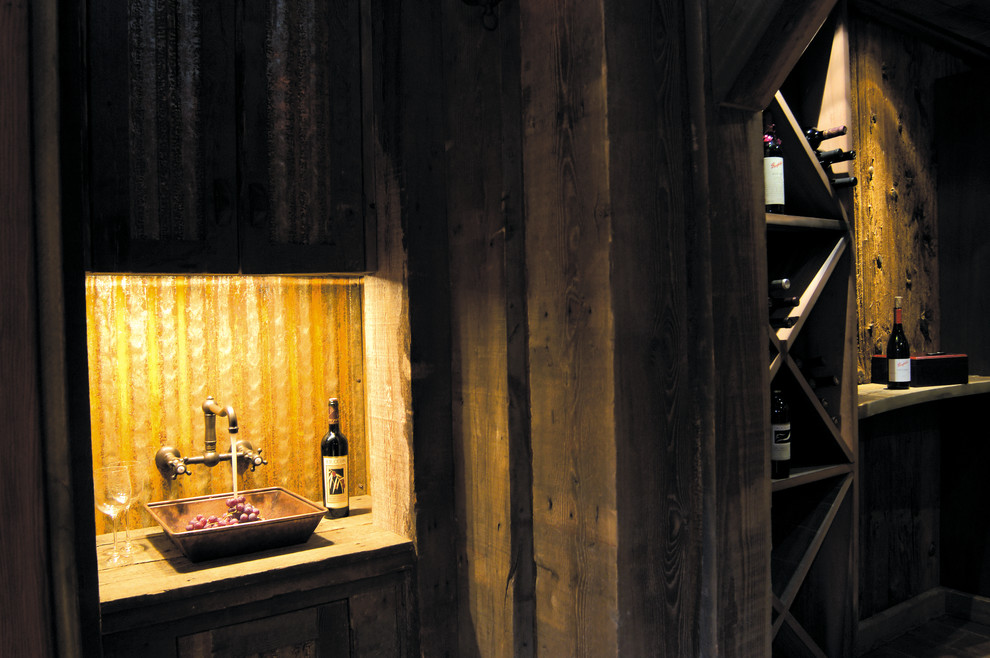 Inspiration for a rustic wine cellar remodel in Other with diamond bins