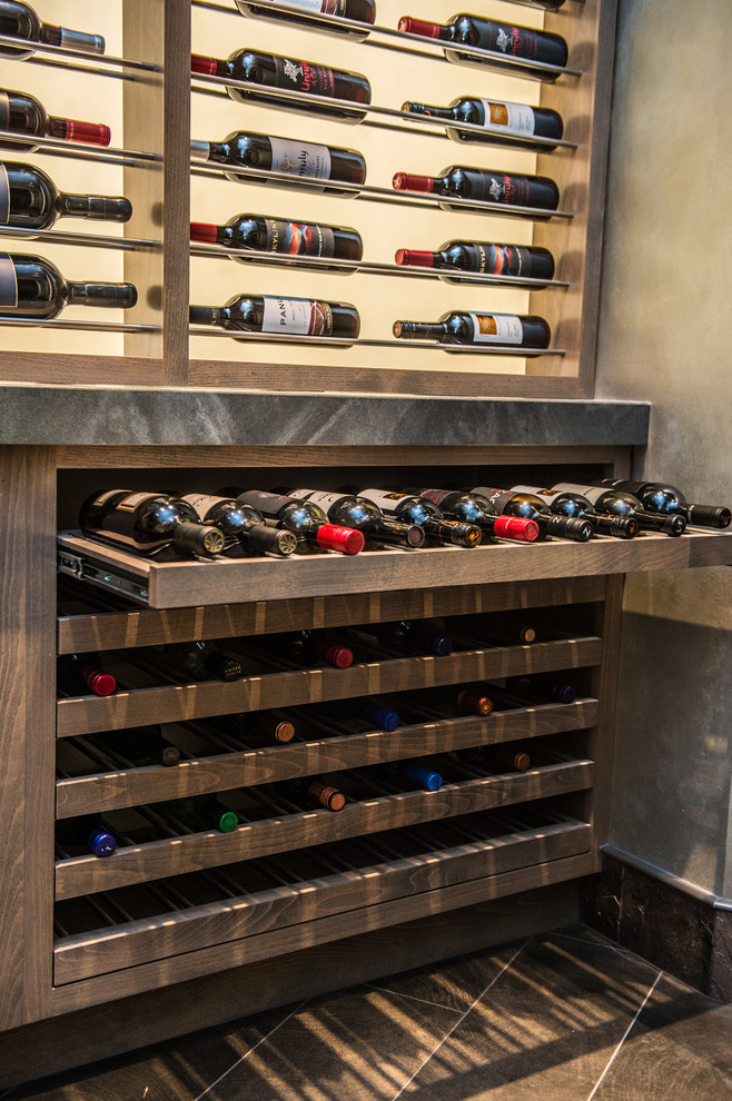 Contemporary wine cellar in San Diego with display racks.