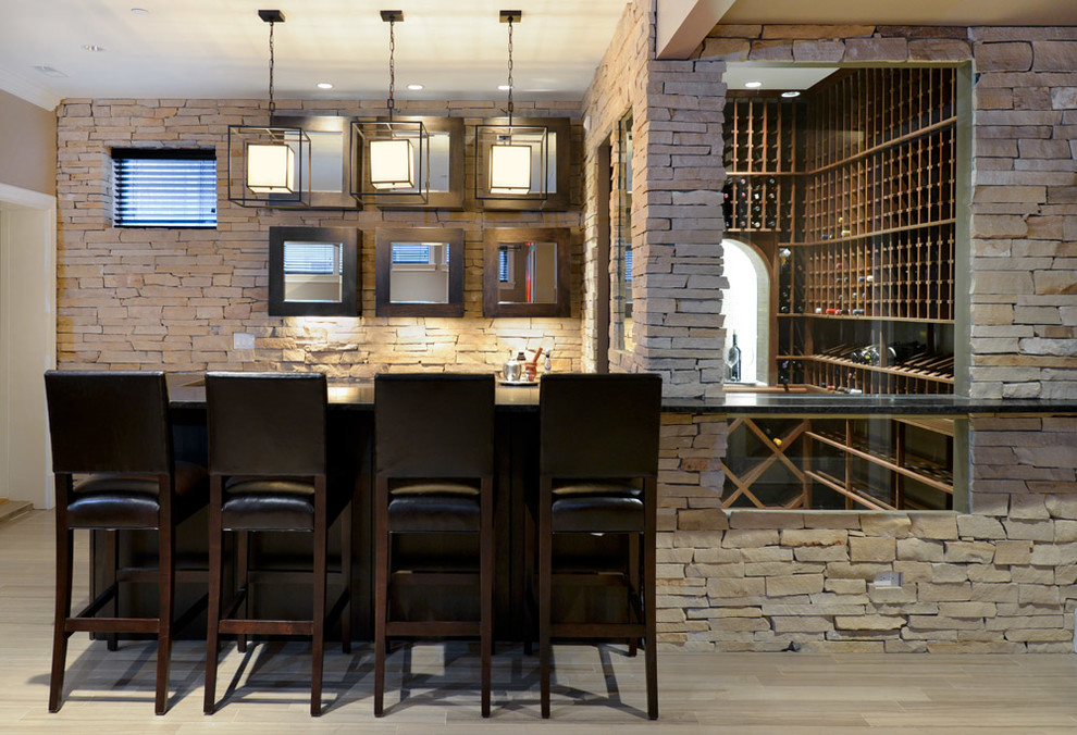 Example of a mountain style wine cellar design in Chicago with storage racks