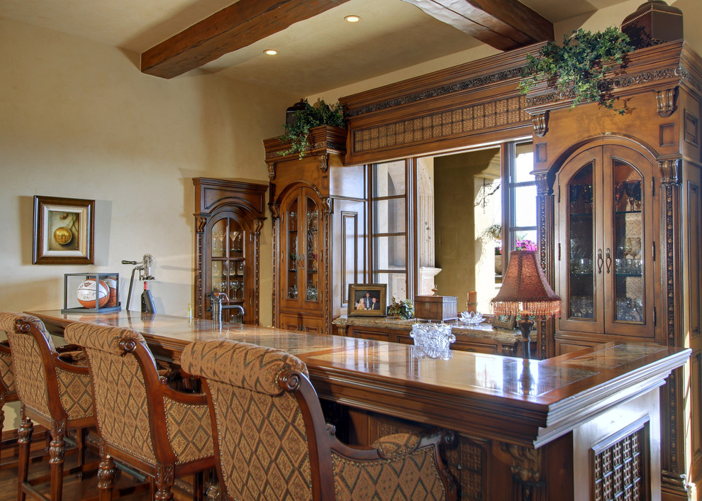 Example of a tuscan wine cellar design in Phoenix