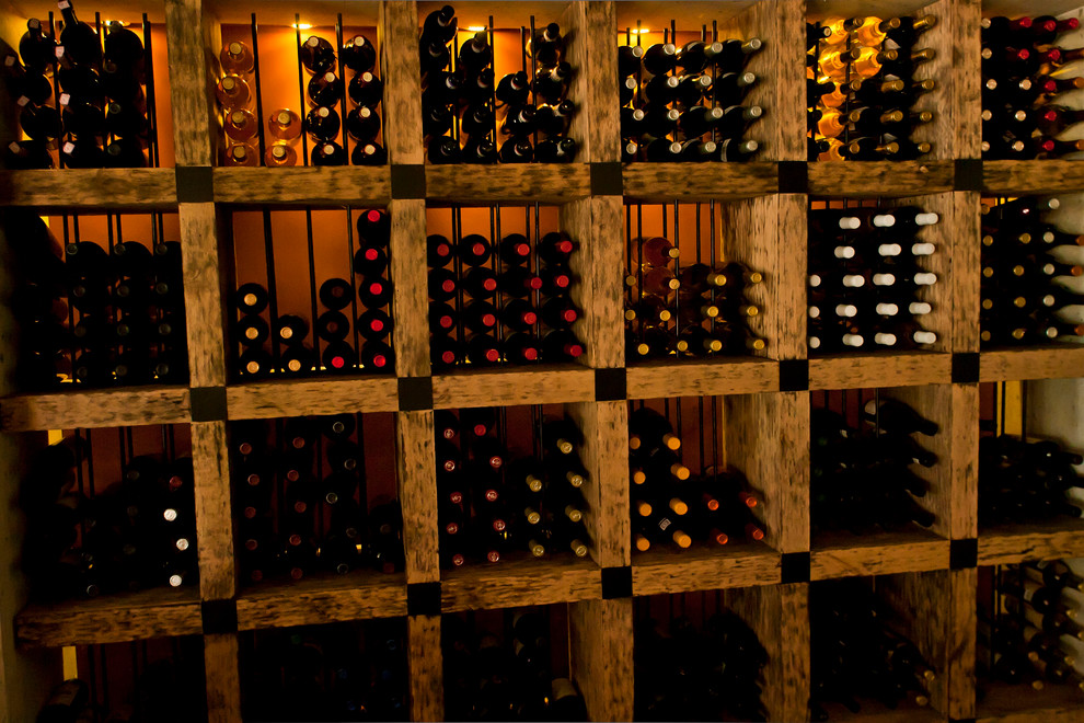 Inspiration for a contemporary wine cellar remodel in Other