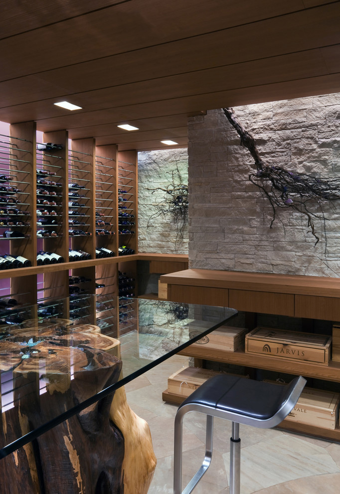 Photo of a large contemporary wine cellar in Dallas with storage racks.