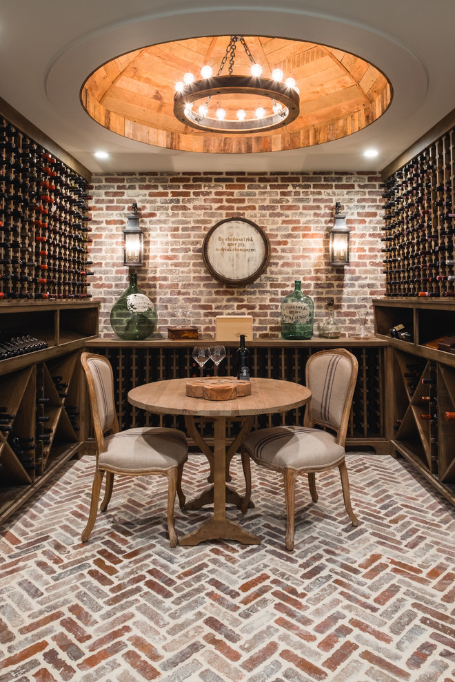Design ideas for a traditional wine cellar in Atlanta with brick flooring and storage racks.