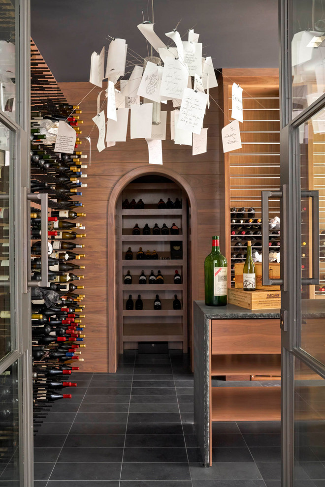 Photo of a contemporary wine cellar in Dallas.