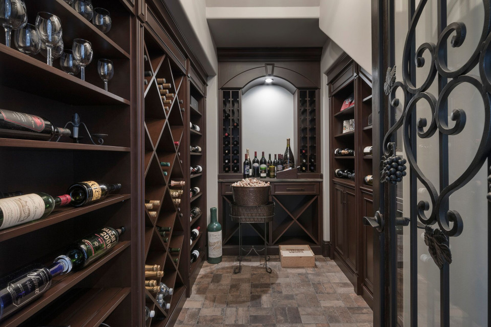 Wine cellar - mediterranean wine cellar idea in Orlando