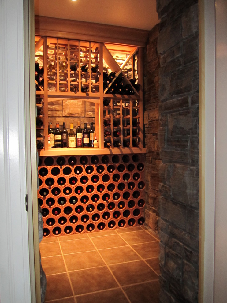 Wine cellar - traditional wine cellar idea in Toronto