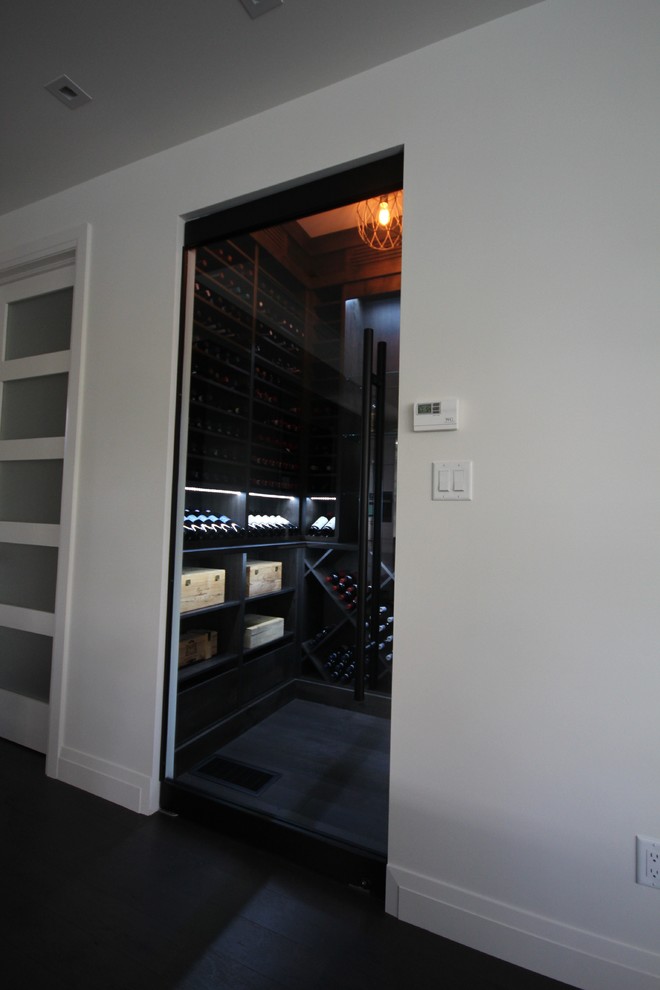 This is an example of a contemporary wine cellar in Ottawa.