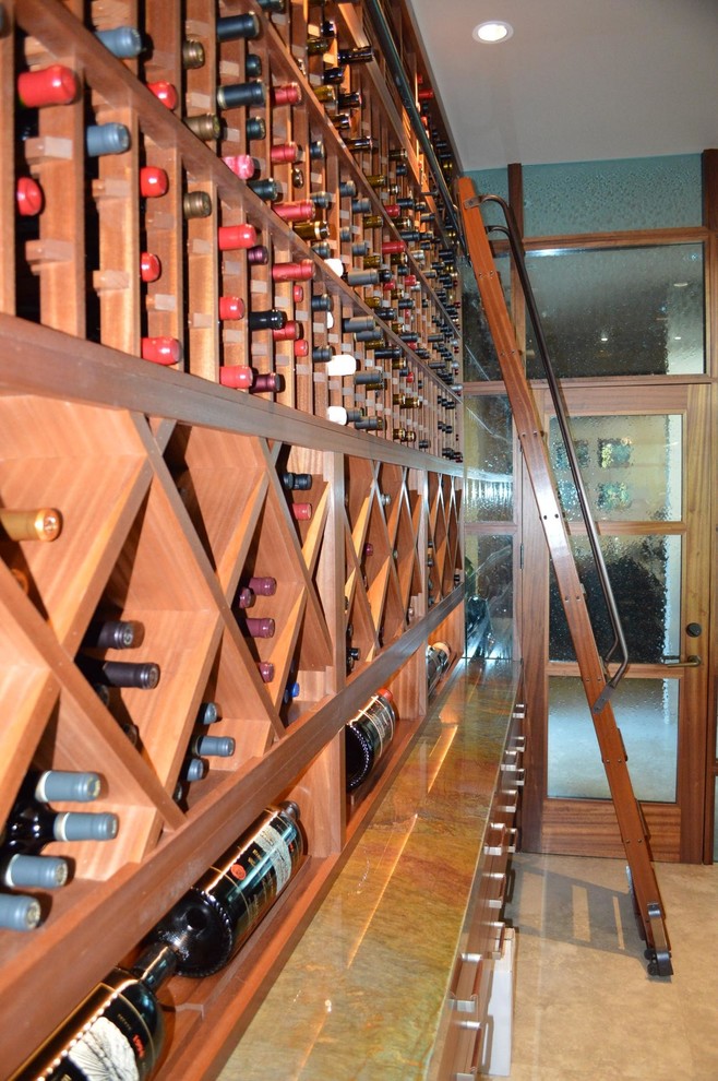 Large bohemian wine cellar in San Diego with storage racks.