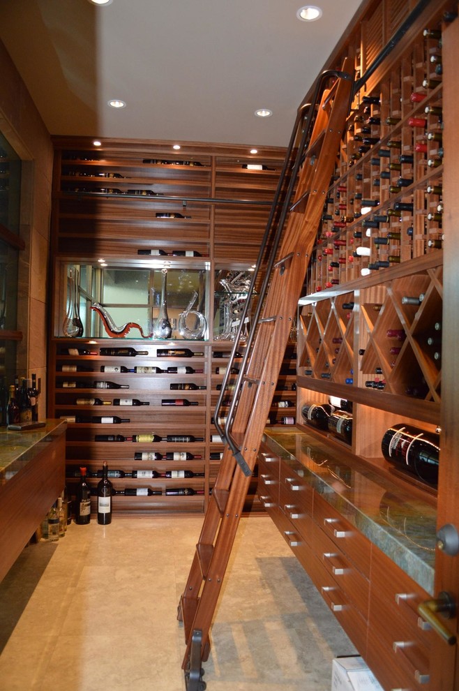 This is an example of a large contemporary wine cellar in San Diego with storage racks.