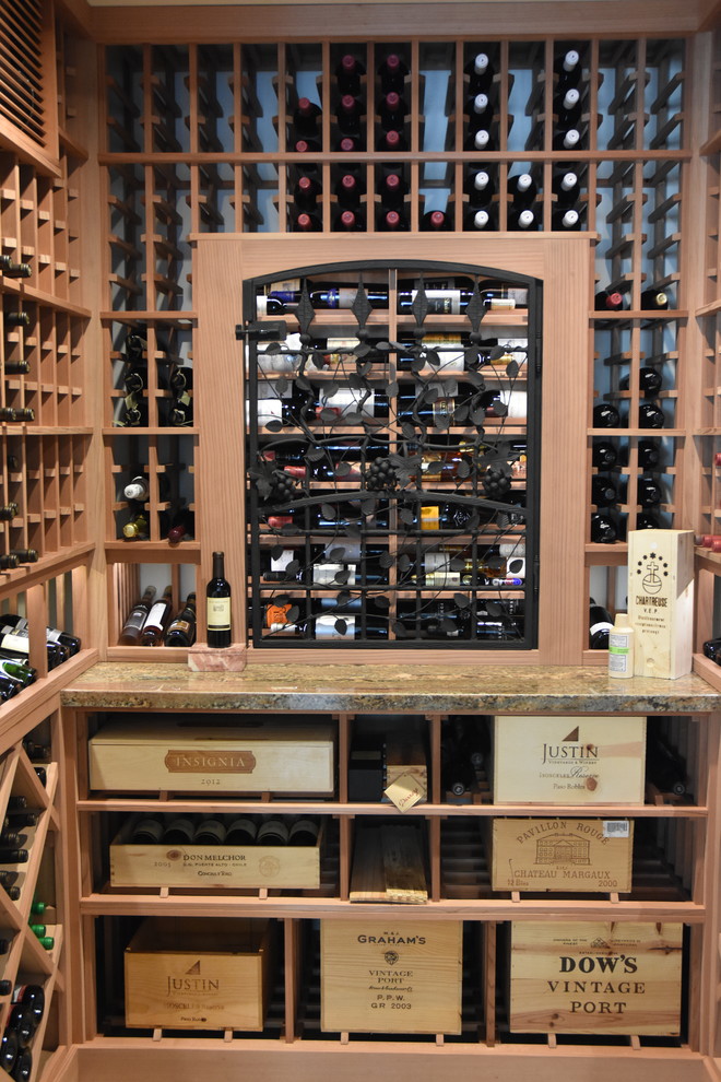 Laguna Hills Orange Small County Custom Wine Cellar with Wrought Iron