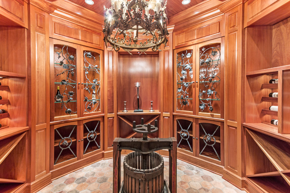 Design ideas for a large classic wine cellar in Milwaukee with terracotta flooring and cube storage.
