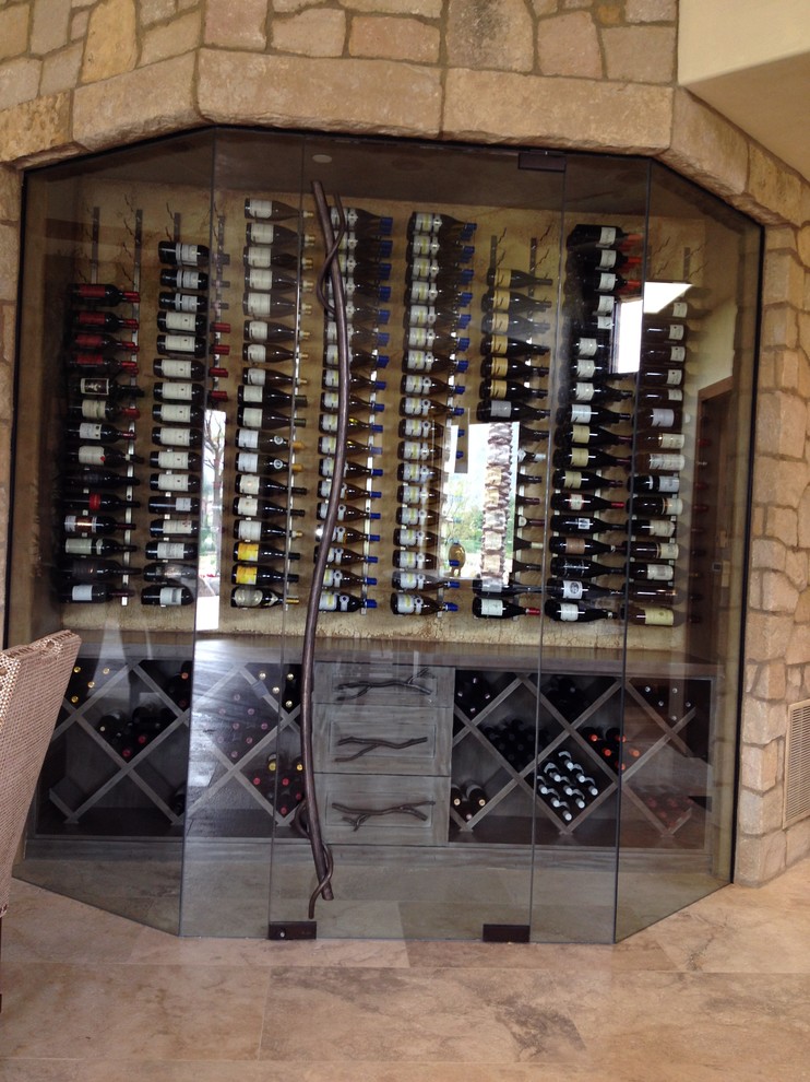 Photo of a large eclectic wine cellar in Los Angeles with ceramic flooring and storage racks.