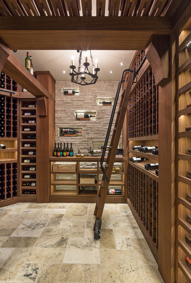 Design ideas for a large classic wine cellar in Omaha with ceramic flooring, storage racks and beige floors.