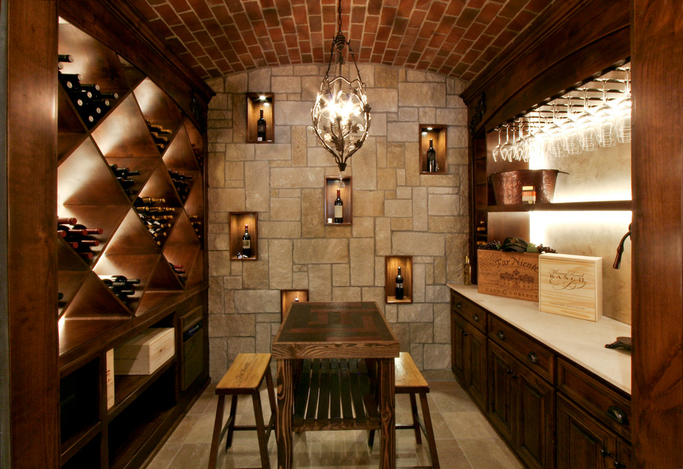 Mountain style ceramic tile wine cellar photo in Kansas City with diamond bins