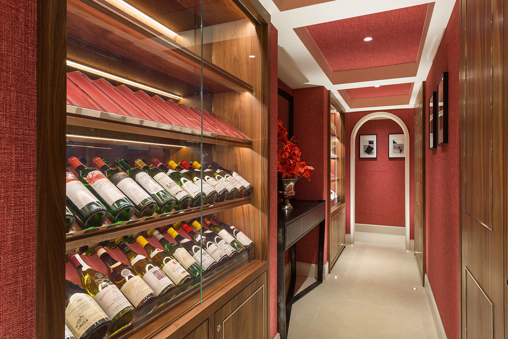 Design ideas for a classic wine cellar in Other with display racks and beige floors.