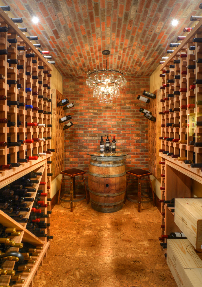 Idée de décoration pour une cave à vin chalet avec un sol en linoléum et des casiers.