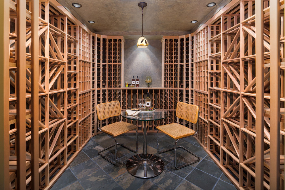 Wine cellar - huge 1960s wine cellar idea in Seattle with storage racks