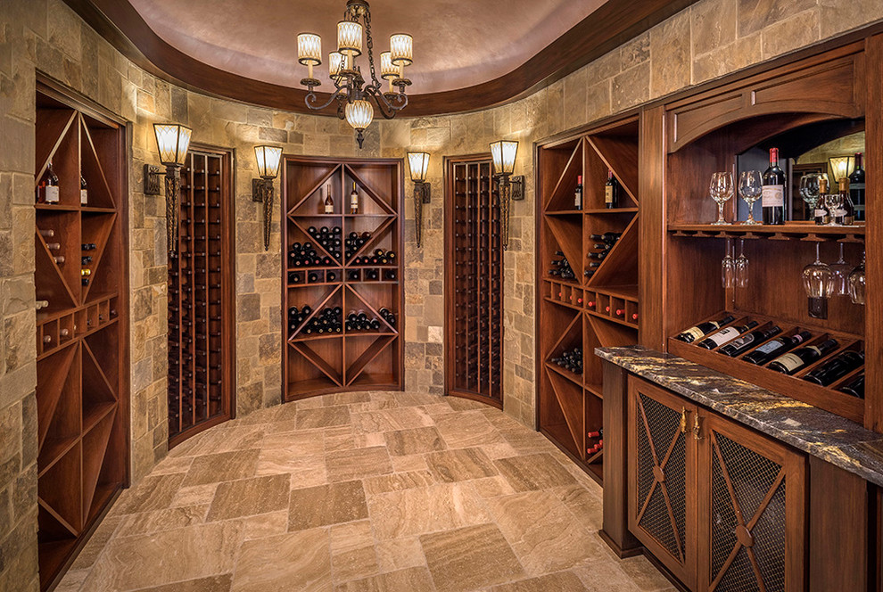 Wine cellar - large traditional wine cellar idea in Other with display racks
