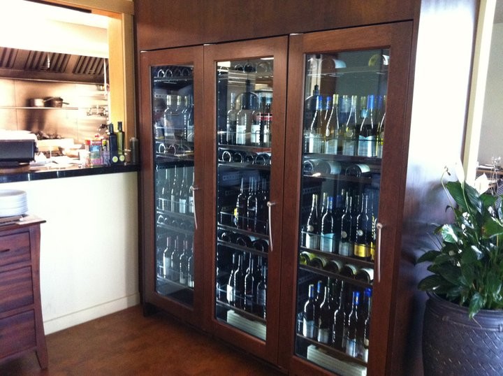 This is an example of a contemporary wine cellar in Vancouver.