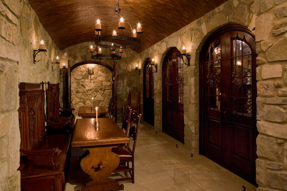 Example of a classic wine cellar design in Austin with storage racks