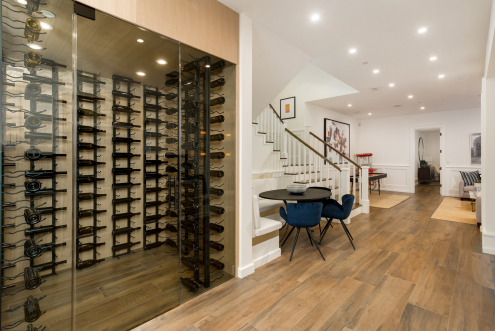 Inspiration for a medium sized contemporary wine cellar in Los Angeles with display racks.