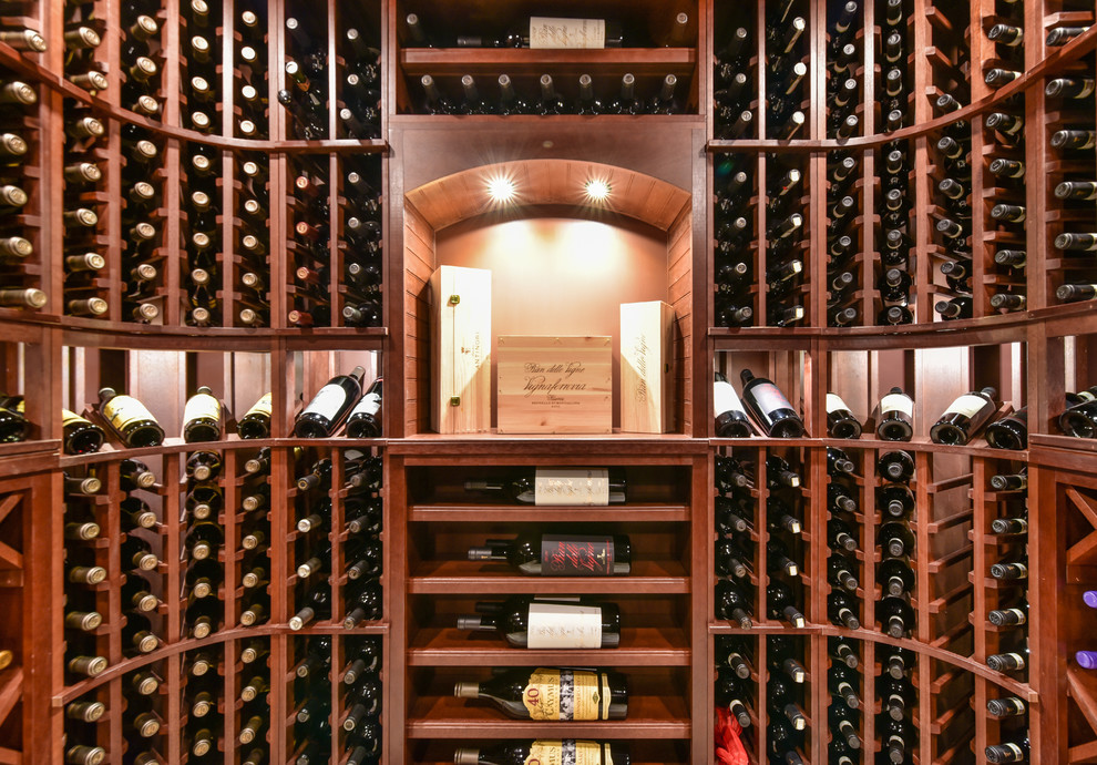 Photo of a medium sized traditional wine cellar in Boston with storage racks.