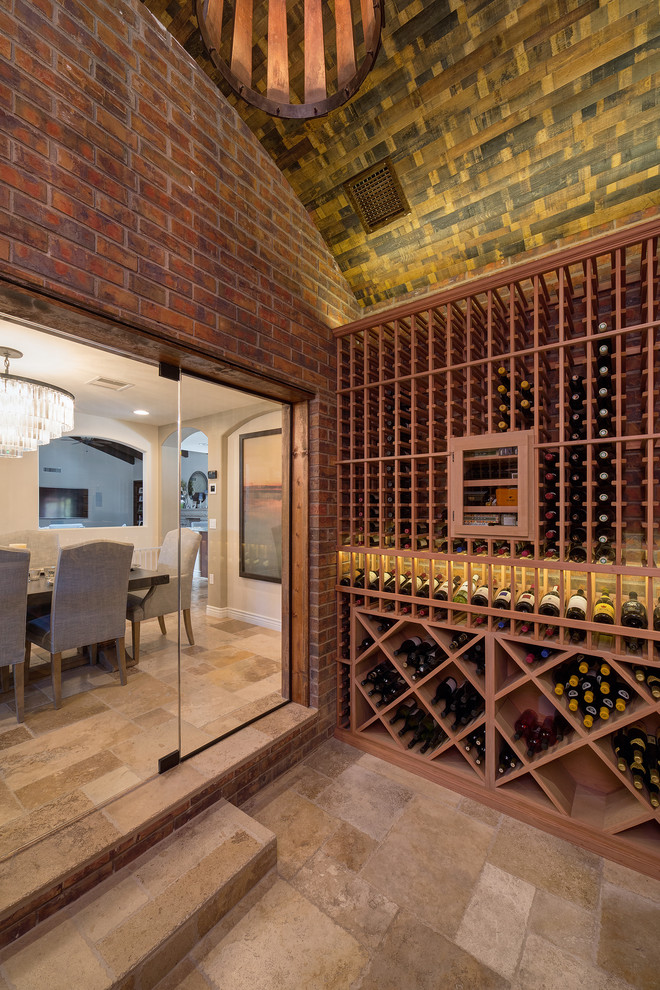 Inspiration for a mediterranean wine cellar in Phoenix with cube storage.