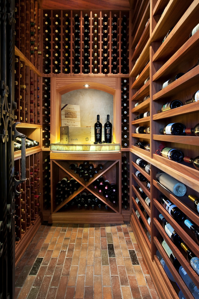 This is an example of a small mediterranean wine cellar in Phoenix.