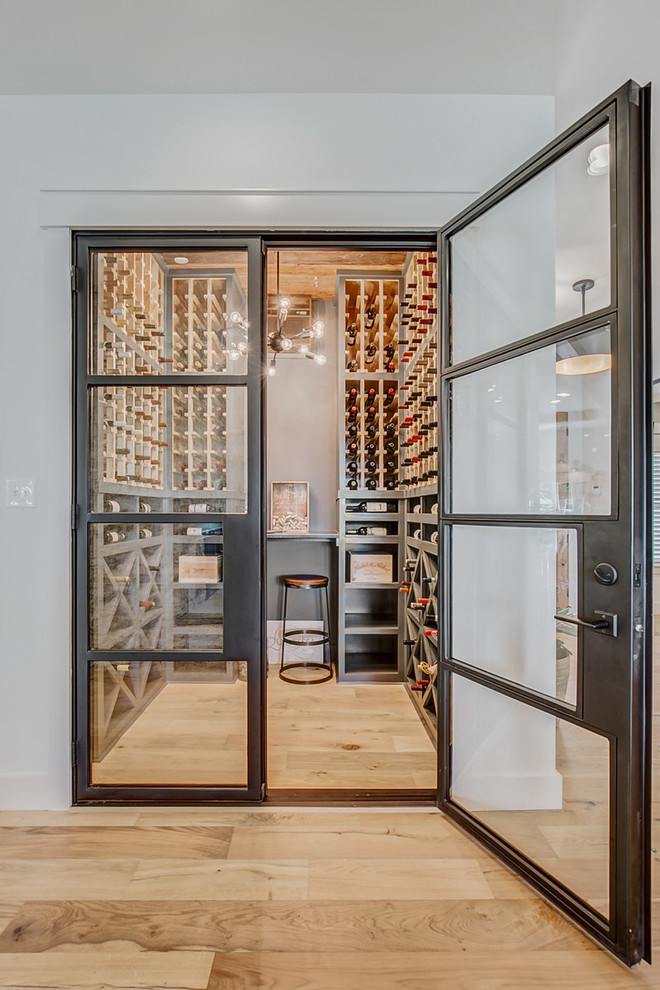 Example of a country wine cellar design in Dallas