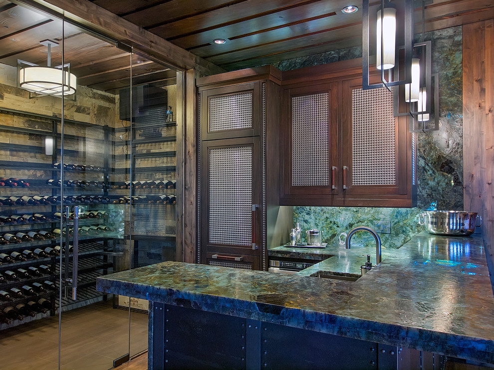 Wine cellar - large contemporary medium tone wood floor wine cellar idea in Denver with display racks