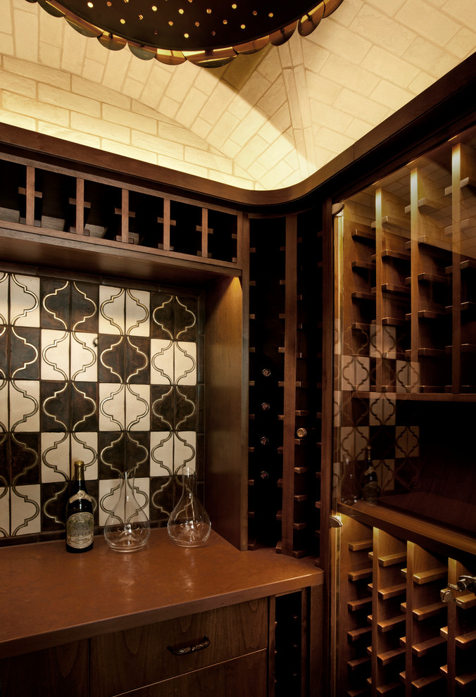 Wine cellar - rustic wine cellar idea in Denver