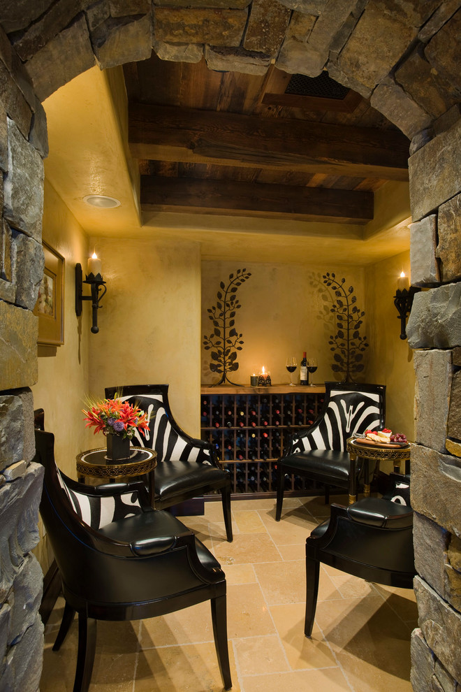Inspiration for a mediterranean wine cellar in Other with storage racks and yellow floors.
