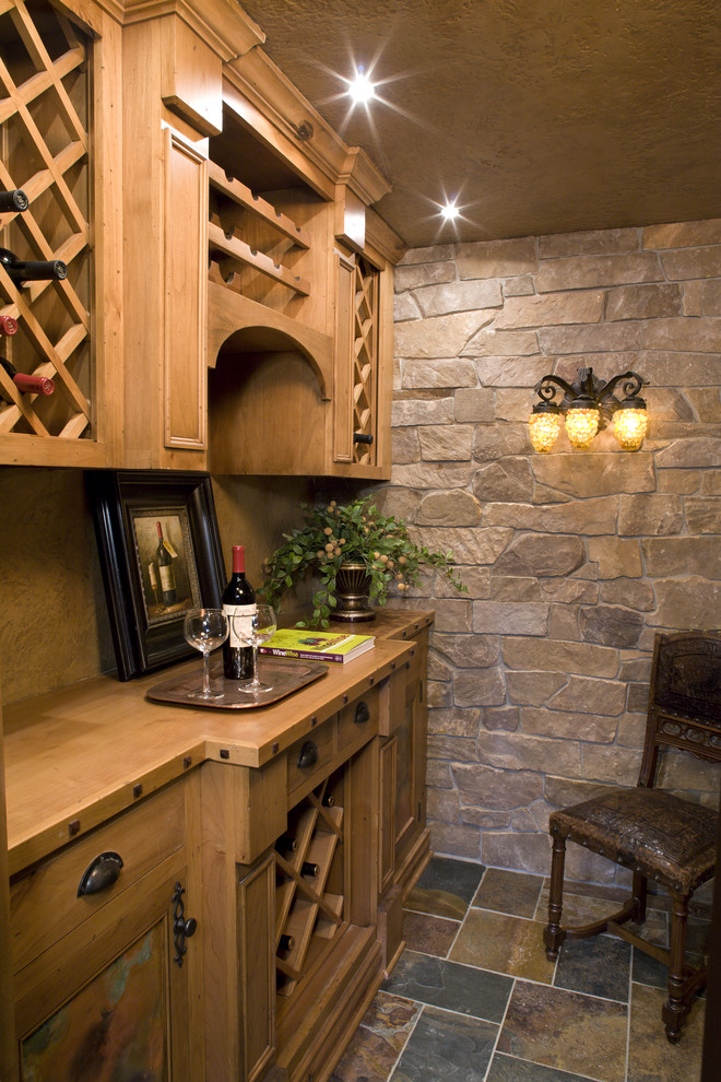 Inspiration for a mid-sized timeless wine cellar remodel in Minneapolis with storage racks
