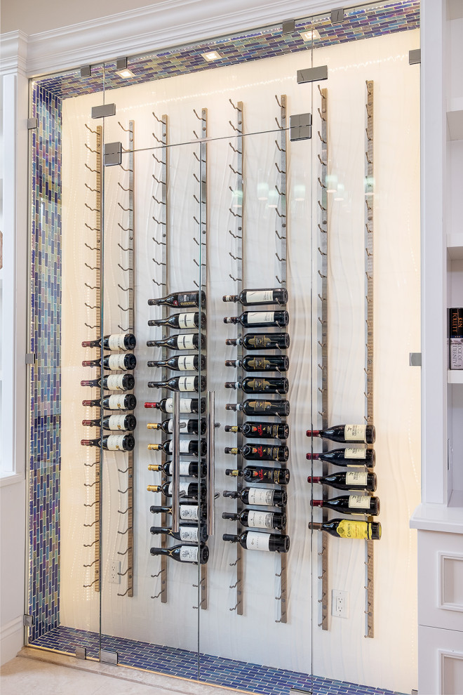 Photo of a world-inspired wine cellar in Miami.
