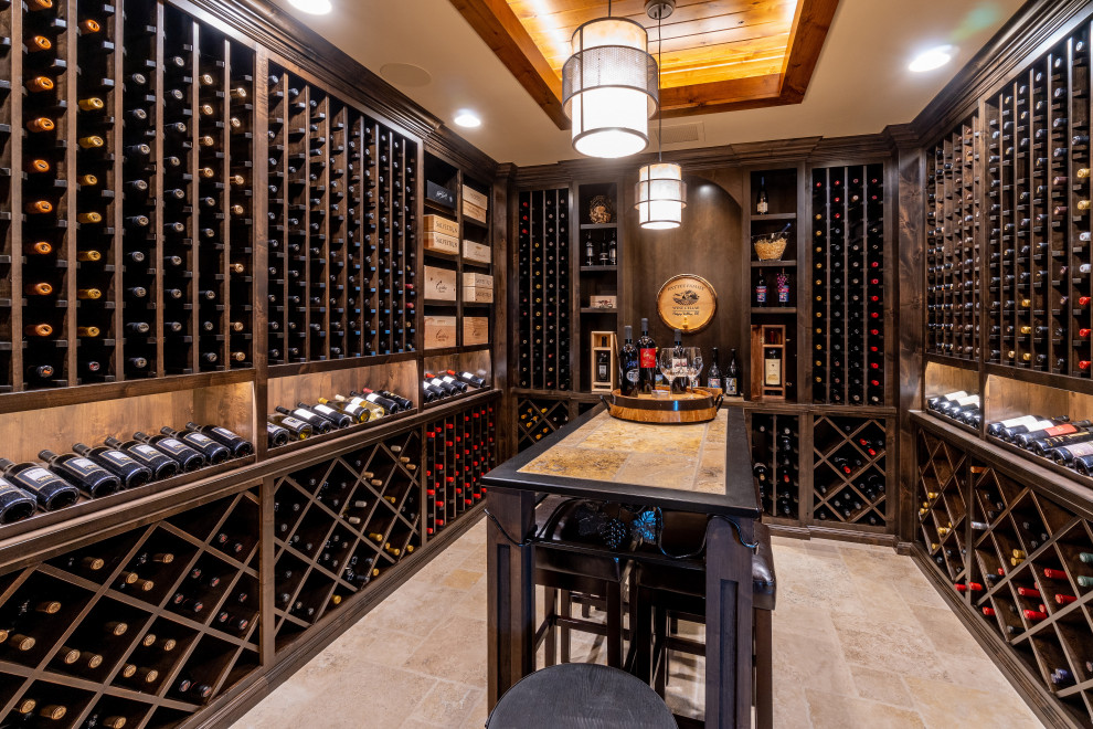 This is an example of a rustic wine cellar in Other with feature lighting.