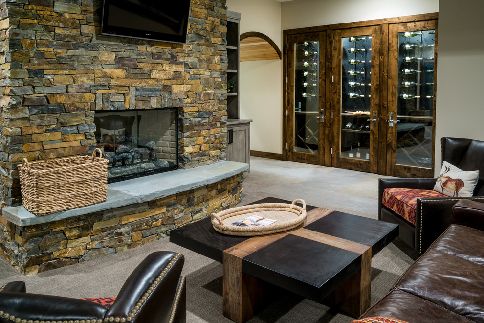 Example of a large zen carpeted wine cellar design in Other with display racks