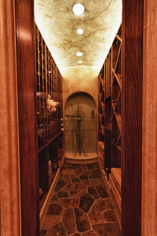 Inspiration for a rustic wine cellar in Louisville.