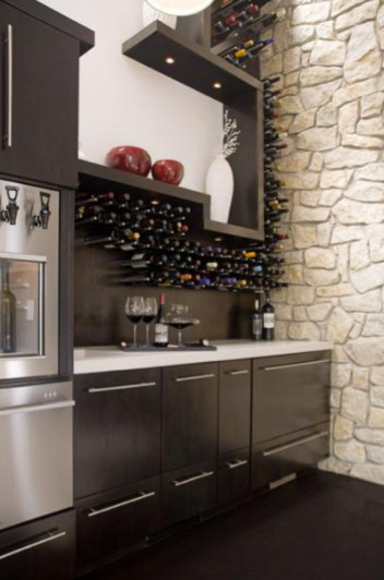This is an example of a contemporary wine cellar in Cincinnati.