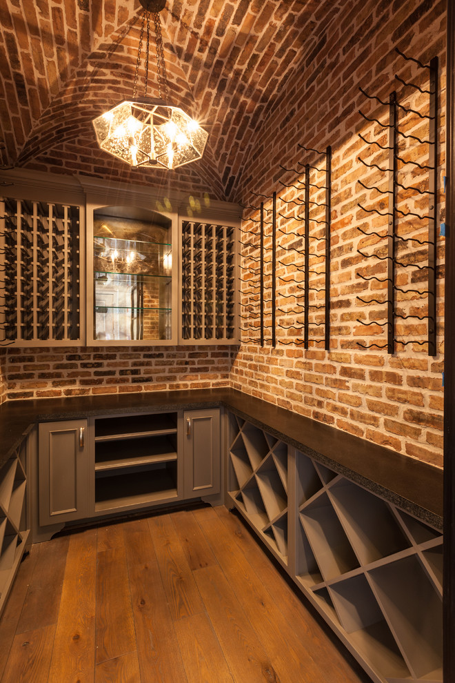 Transitional wine cellar photo in Houston