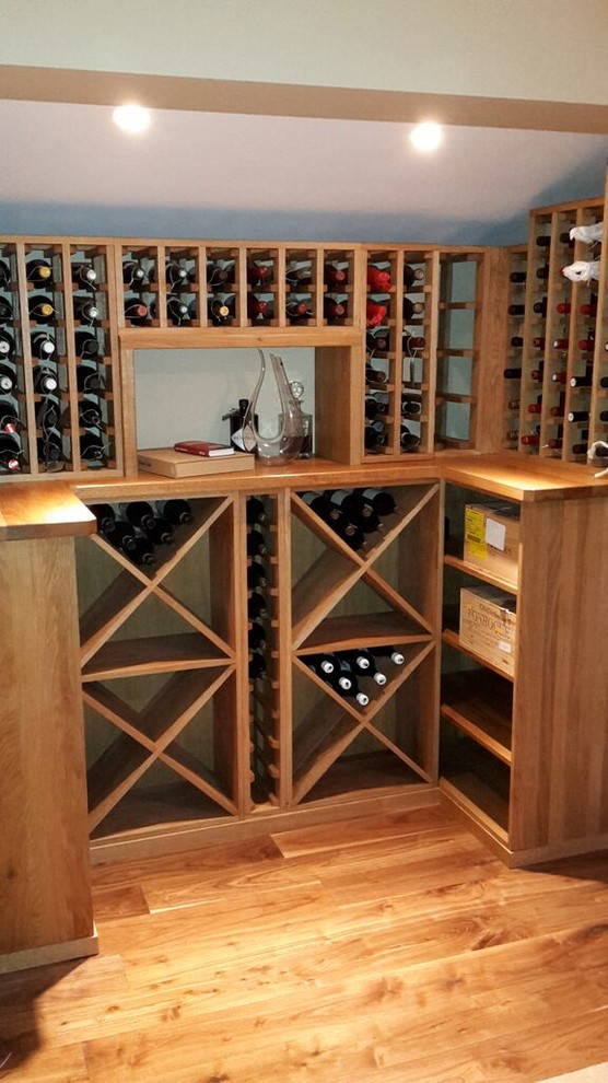 This is an example of a small classic wine cellar in Hertfordshire.