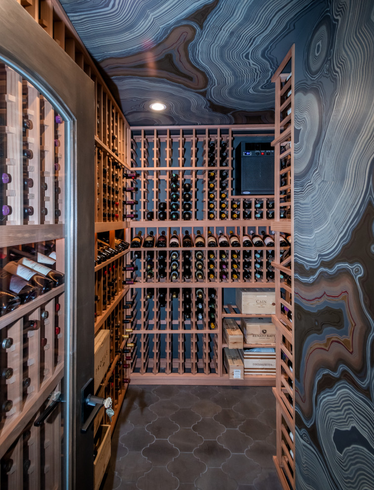 Transitional gray floor wine cellar photo in San Francisco with storage racks