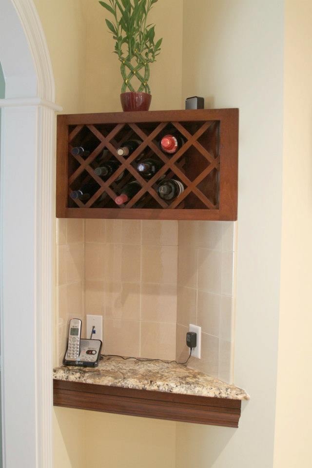 Design ideas for a small classic wine cellar in St Louis with ceramic flooring.