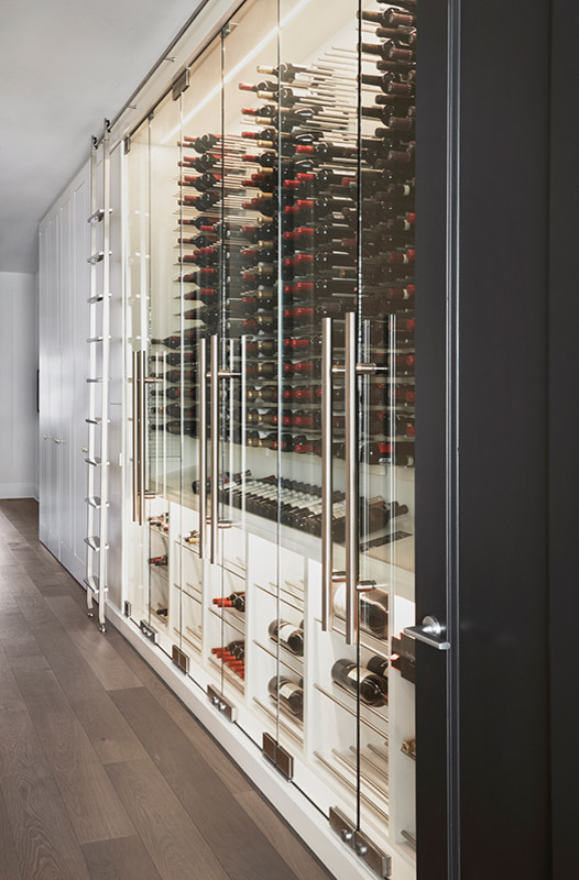 Example of a trendy wine cellar design in Toronto