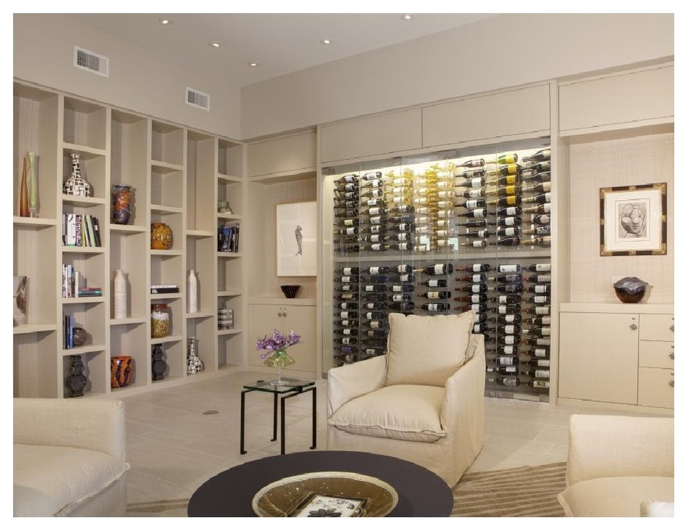 This is an example of a large contemporary wine cellar in Phoenix with porcelain flooring, display racks and beige floors.