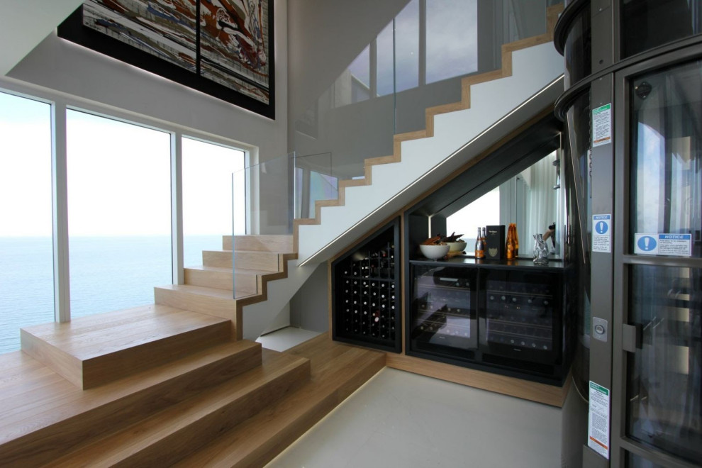 Inspiration for a mid-sized modern staircase remodel in Miami