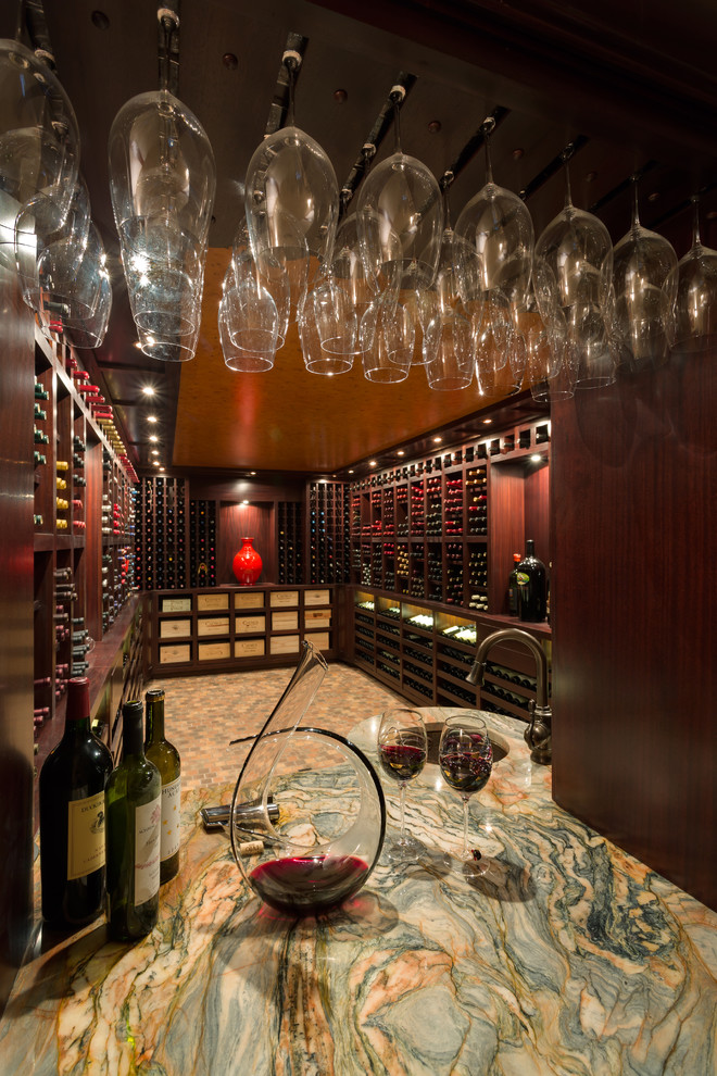 Inspiration for a large contemporary terra-cotta tile and brown floor wine cellar remodel in Raleigh with display racks